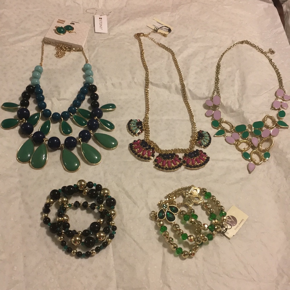3 necklaces, 1 earring and several bracelets